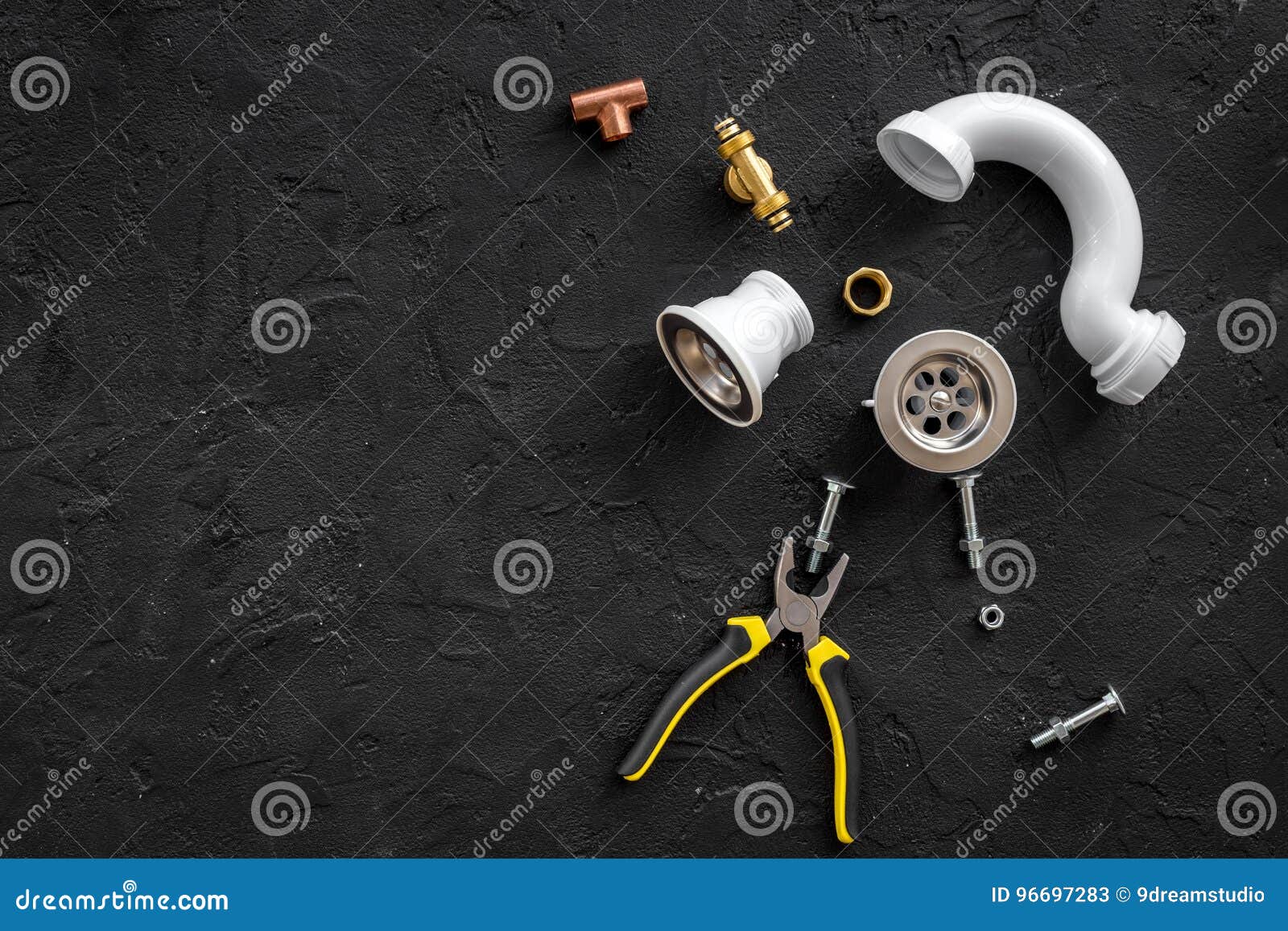 Sink Drain Parts and Plumbing Tools on Black Background Top View