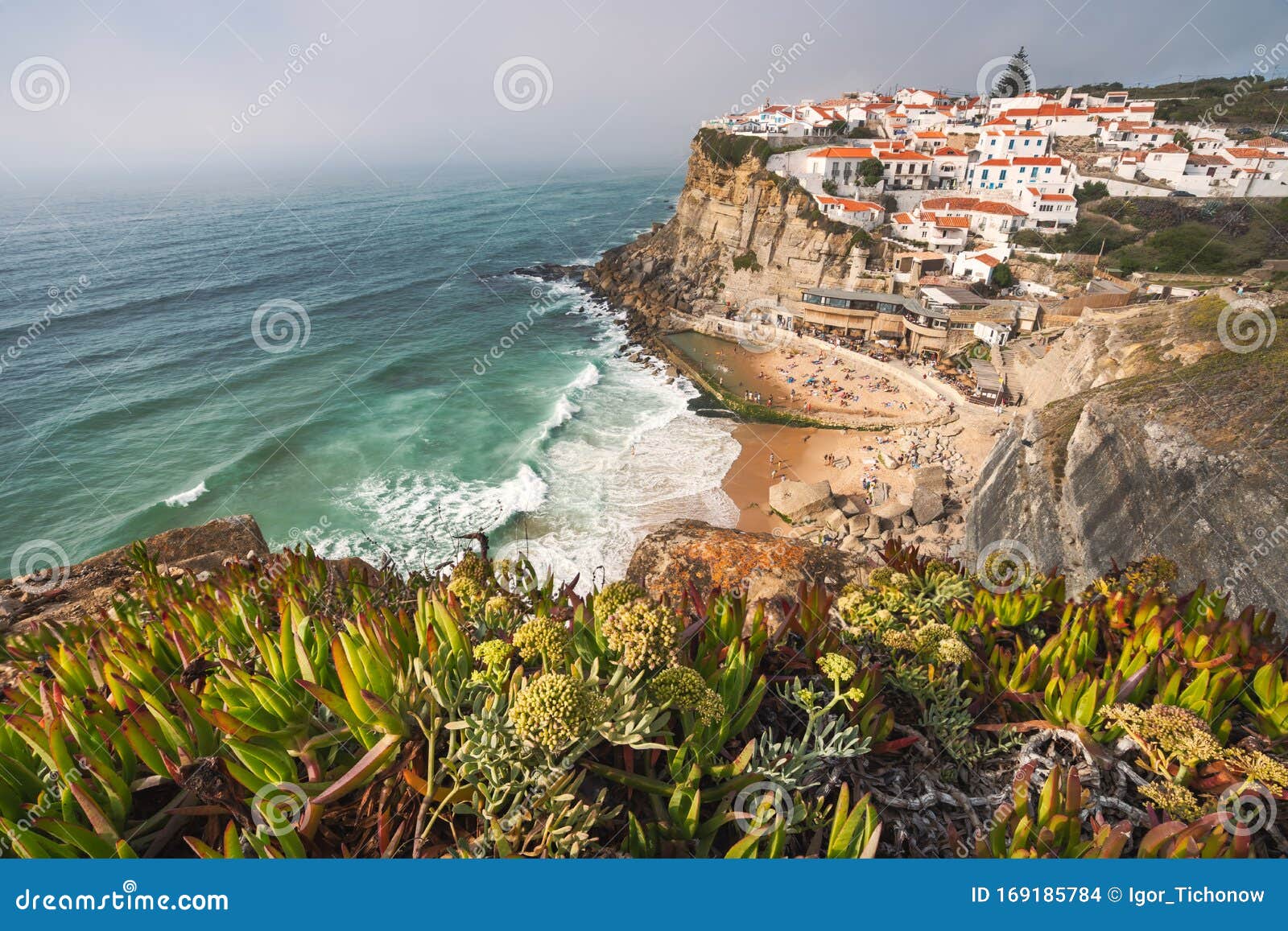 sintra, lisbon, portugal. azenhas do mar white village landmark on the cliff and atlantic ocean waves