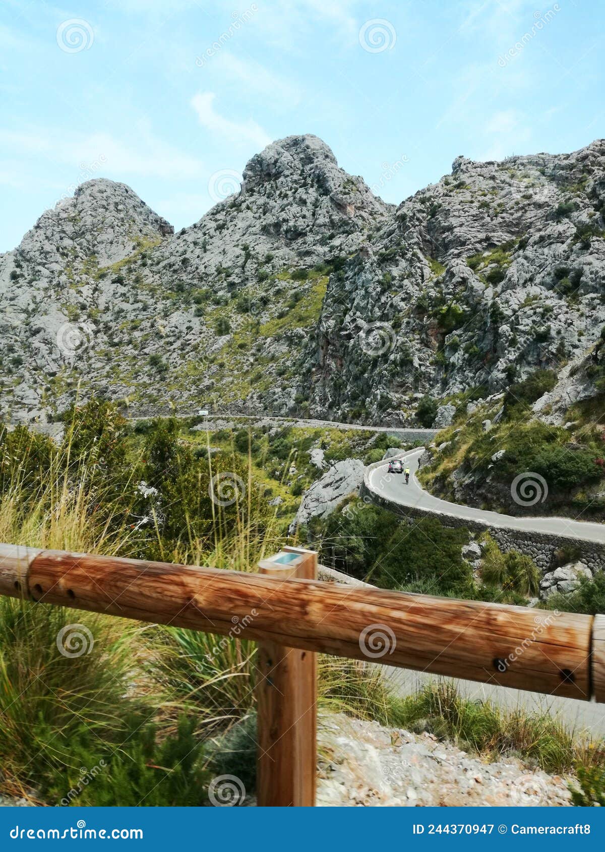 siral serpentine road to sa calobra, mallorca. magnificent weather conditions. vertical shot.