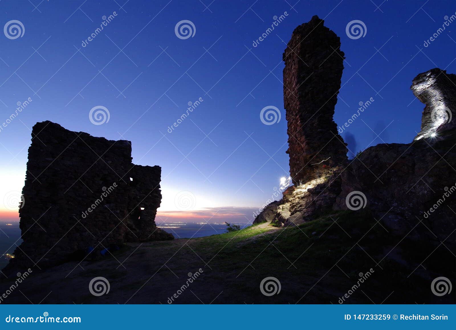 siria medieval fortress in arad county at sunset.