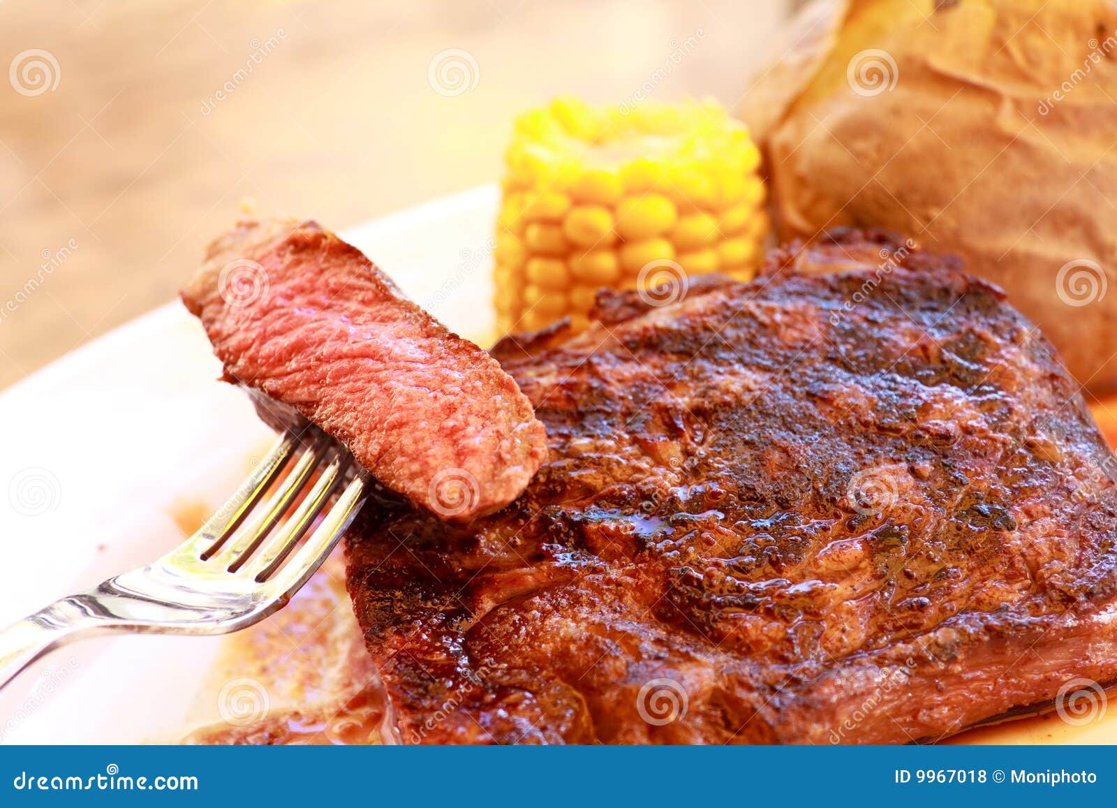 Sirloin Strip Steak with Corn Cob ,vegetables and Stock Photo Image