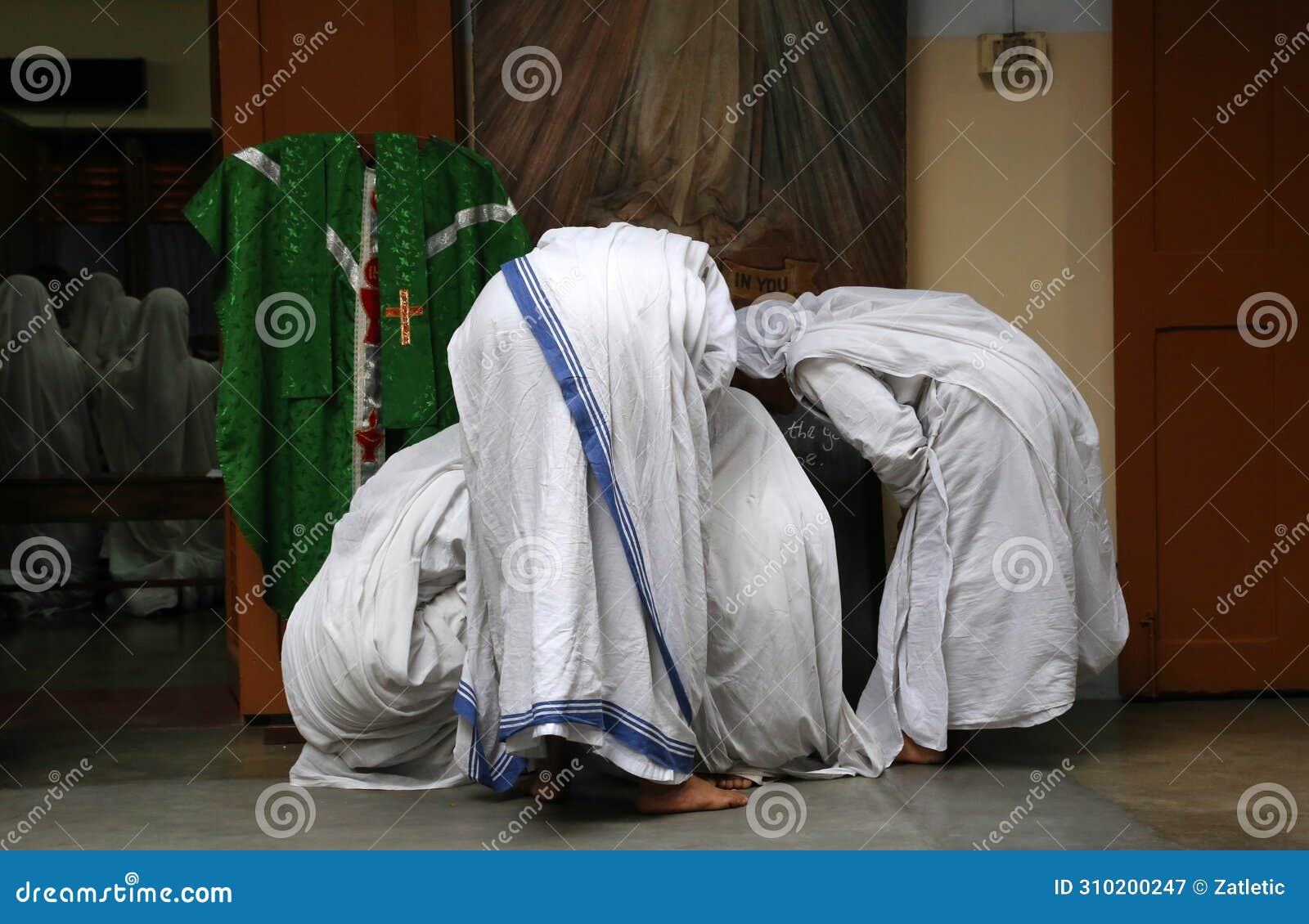 sisters of missionaries of charity preparing for prayer in motherhouse, kolkata
