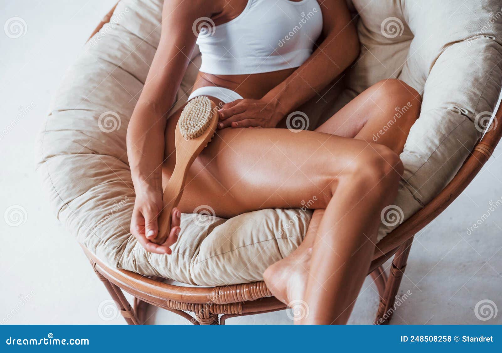 Sits on Chair and Holding Big Brush. Beautiful Woman with Slim Body in  Underwear is in the Studio Stock Photo - Image of dermatology, fitness:  248508258