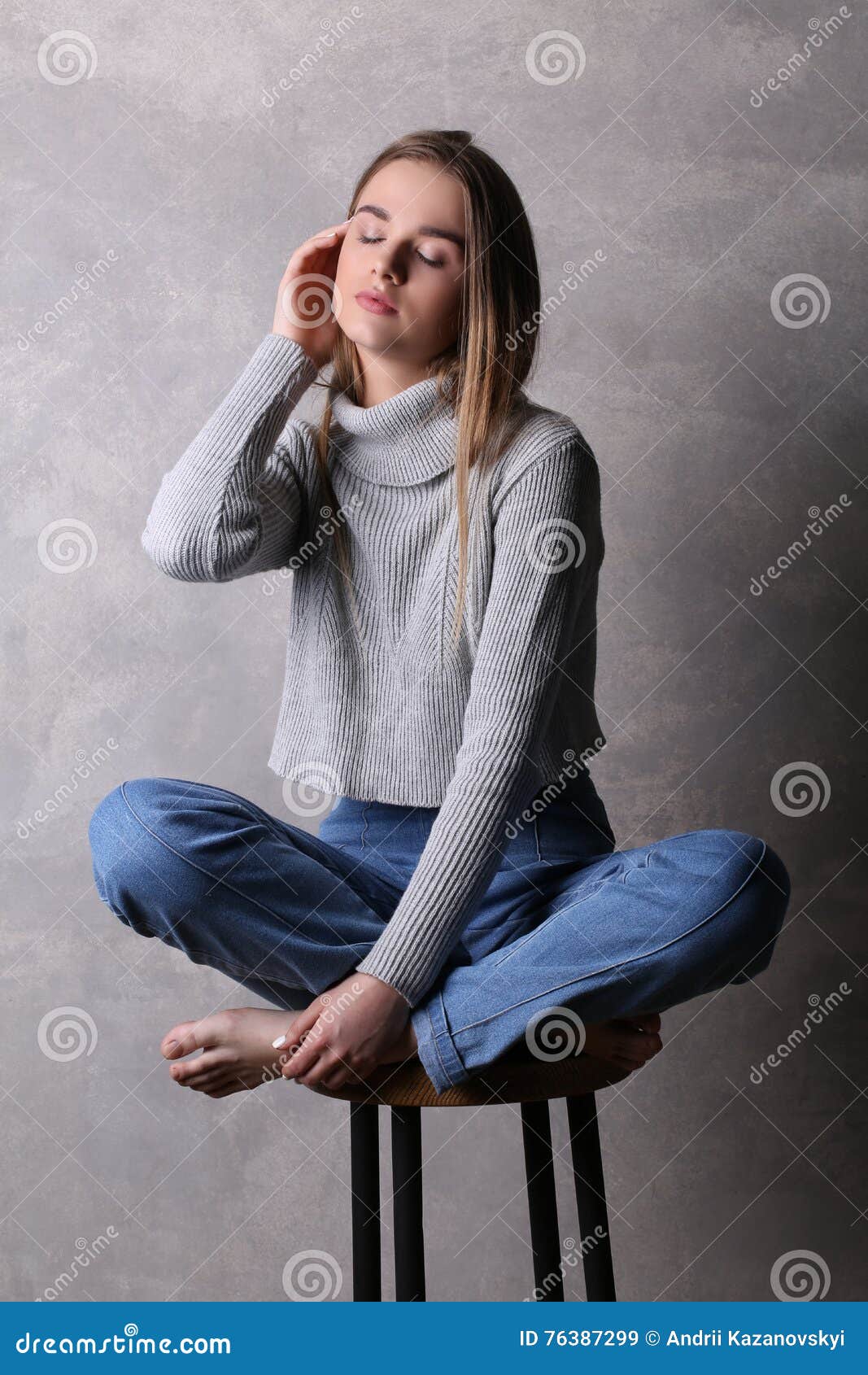 Sitting Teen In Pullover Touchi