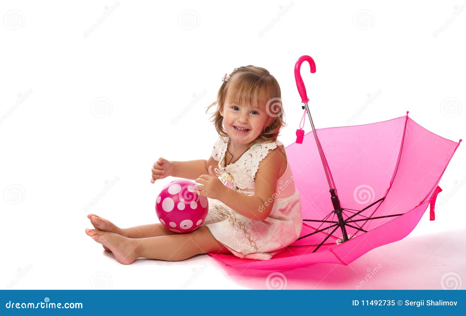 Sitting in an umbrella stock image. Image of girl, baby 11492735