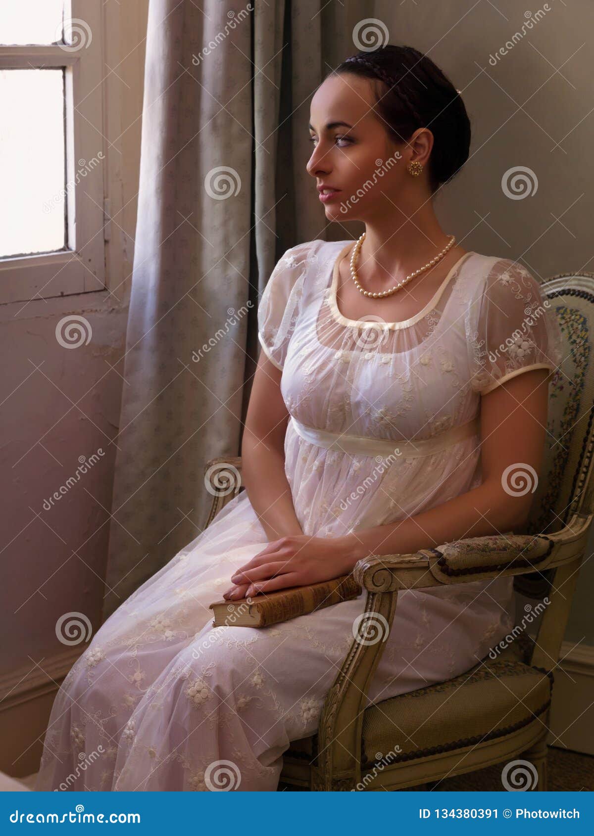 sitting woman in regency dress