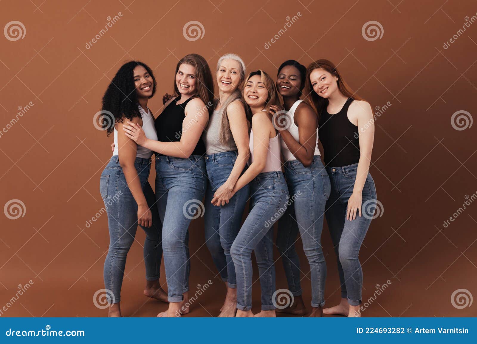 six women of different ages and body types smiling and laughing over brown background