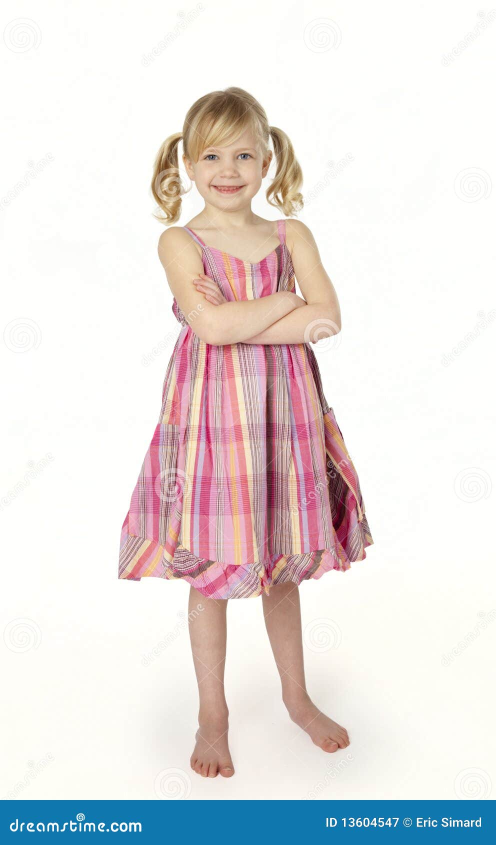 six year old girl standing on white background