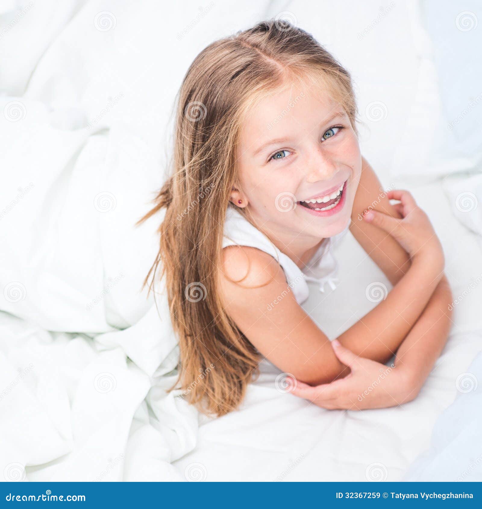 Six Year Old Girl In A White Bed Royalty Free Stock Images Image