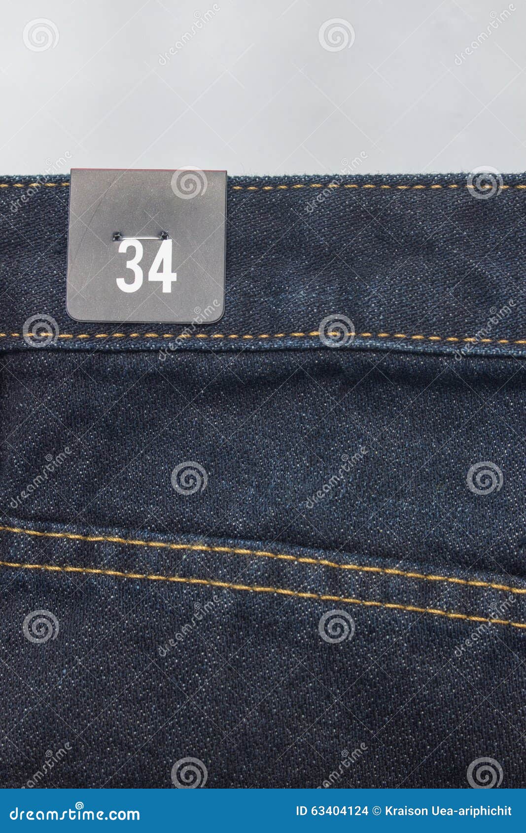 Size label on jeans stock photo. Image of clothing, back 63404124