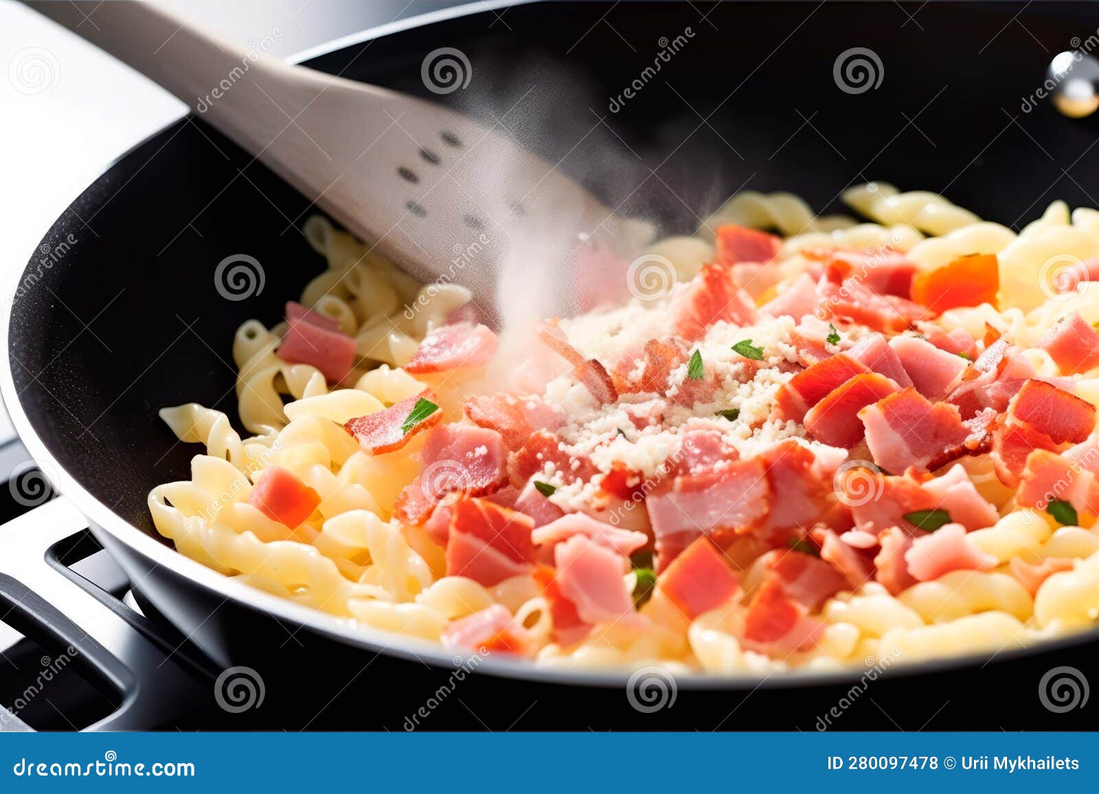 Sizzling Skillet Delight Pasta and Diced Ham Dance on a White Canvas
