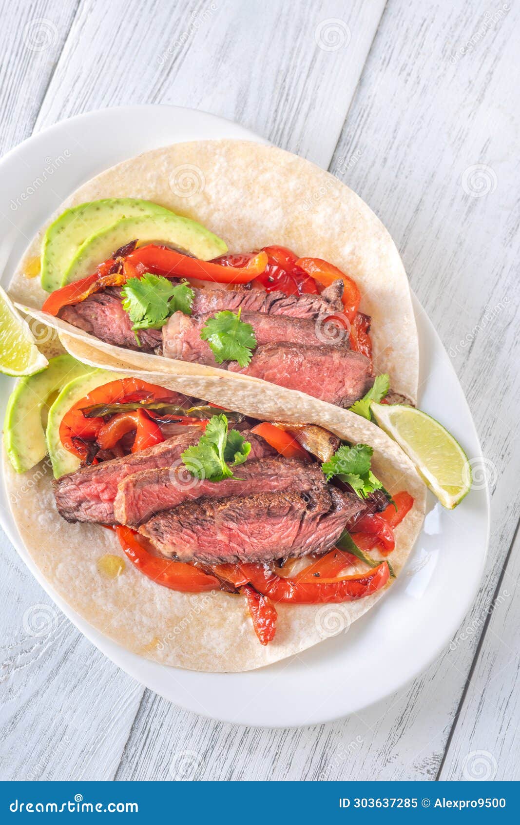 Sizzling Steak Fajitas stock image. Image of fajitas 303637285