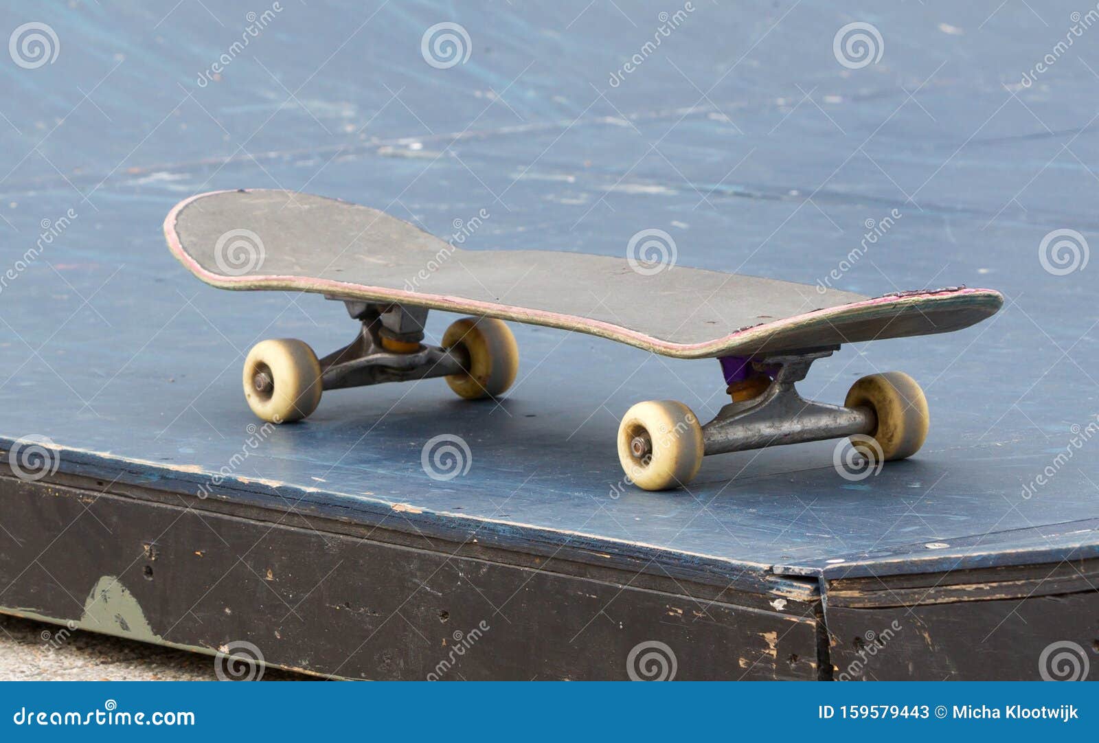 Skateboard on a halfpipe stock image. Image of wheels 159579443