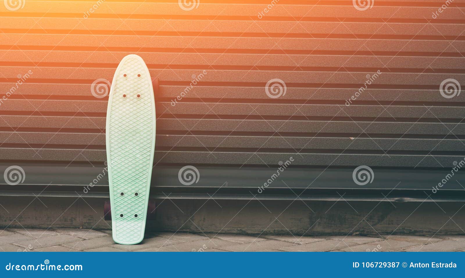 A Skateboard Leaning Against Wall, Empty Space at the Right for Custom