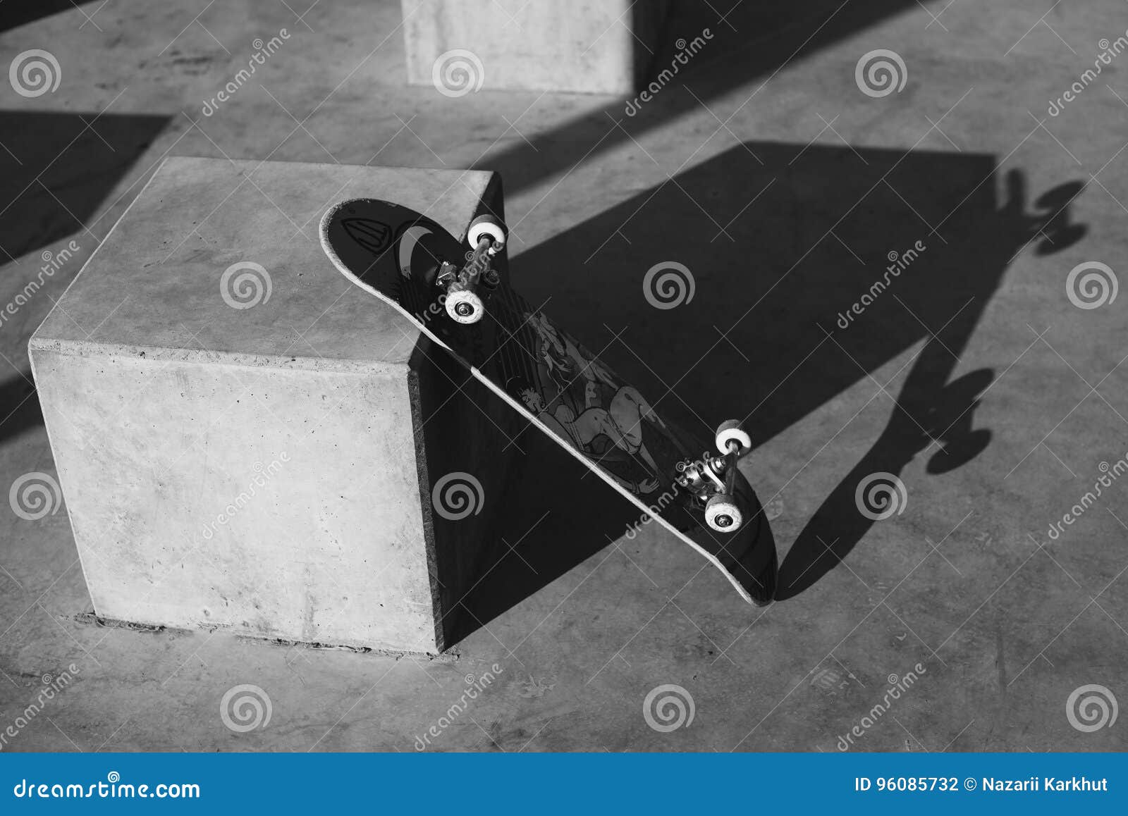 Skateboard Leaning Against Wall. Skateboard in the Modern Space Stock