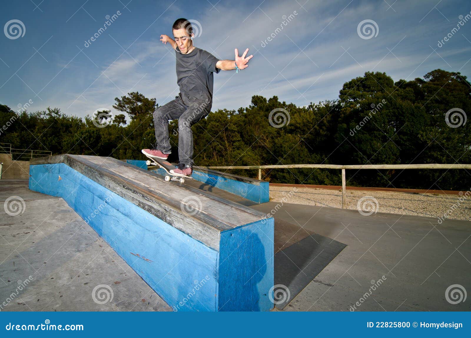Skateboarder on a grind stock photo. Image of skater 22825800