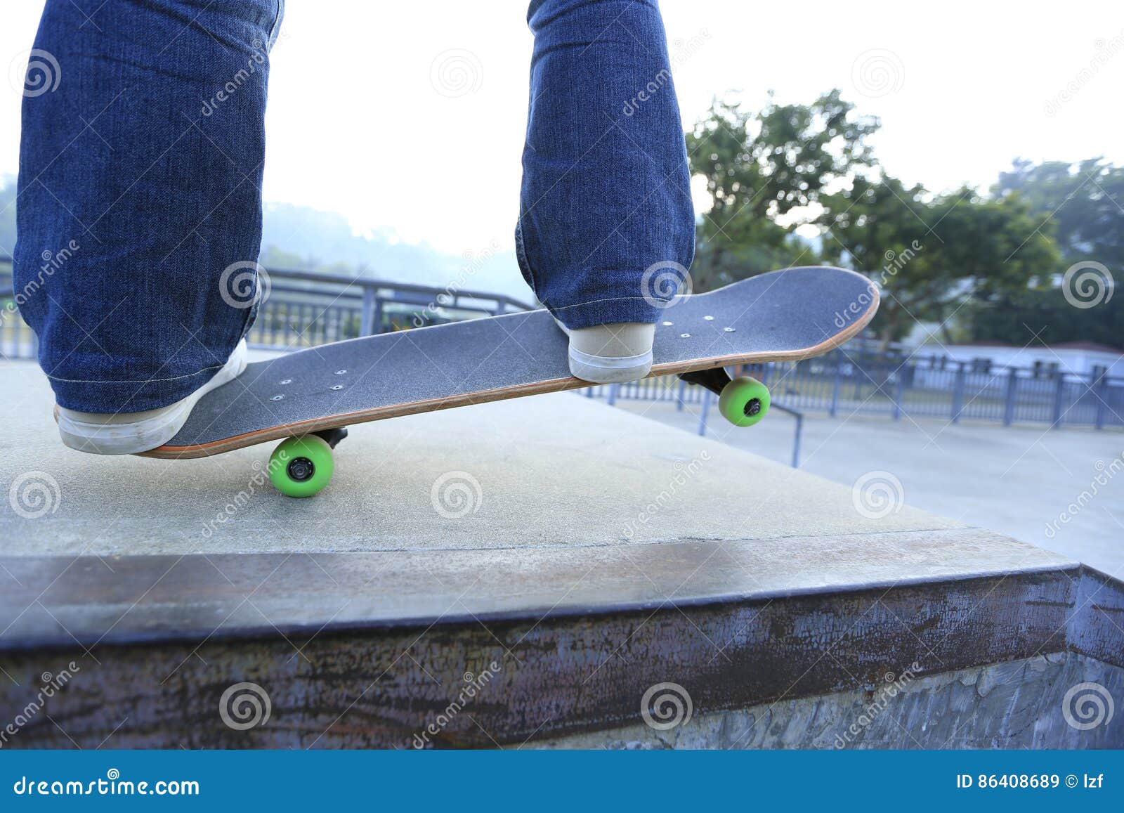 Skateboarder Legs Riding Skateboard at Skatepark Stock Image Image of