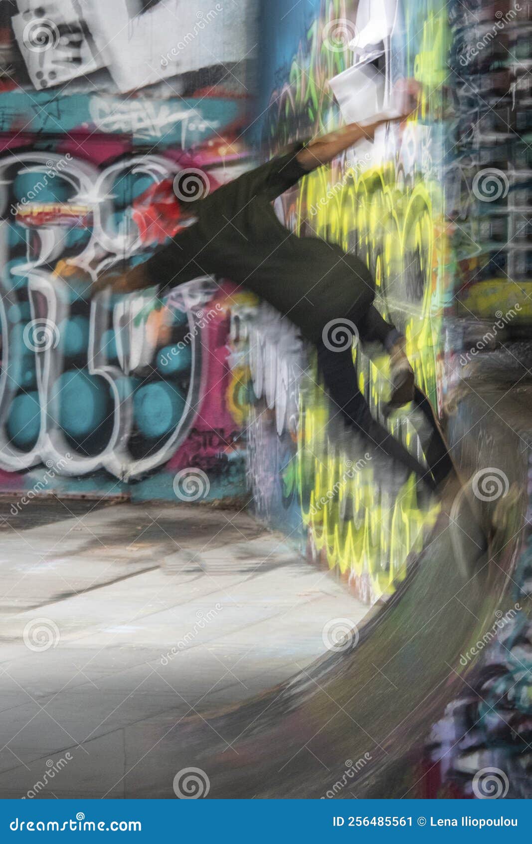 skateboarder making flip-tricks on his skateboard