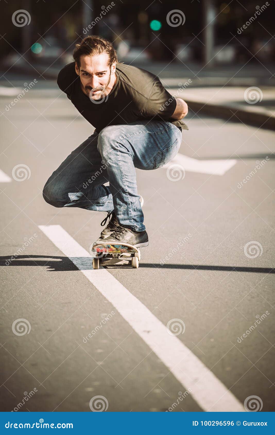 Skateboarder Ride a Skateboard Slope through the City Street Stock ...