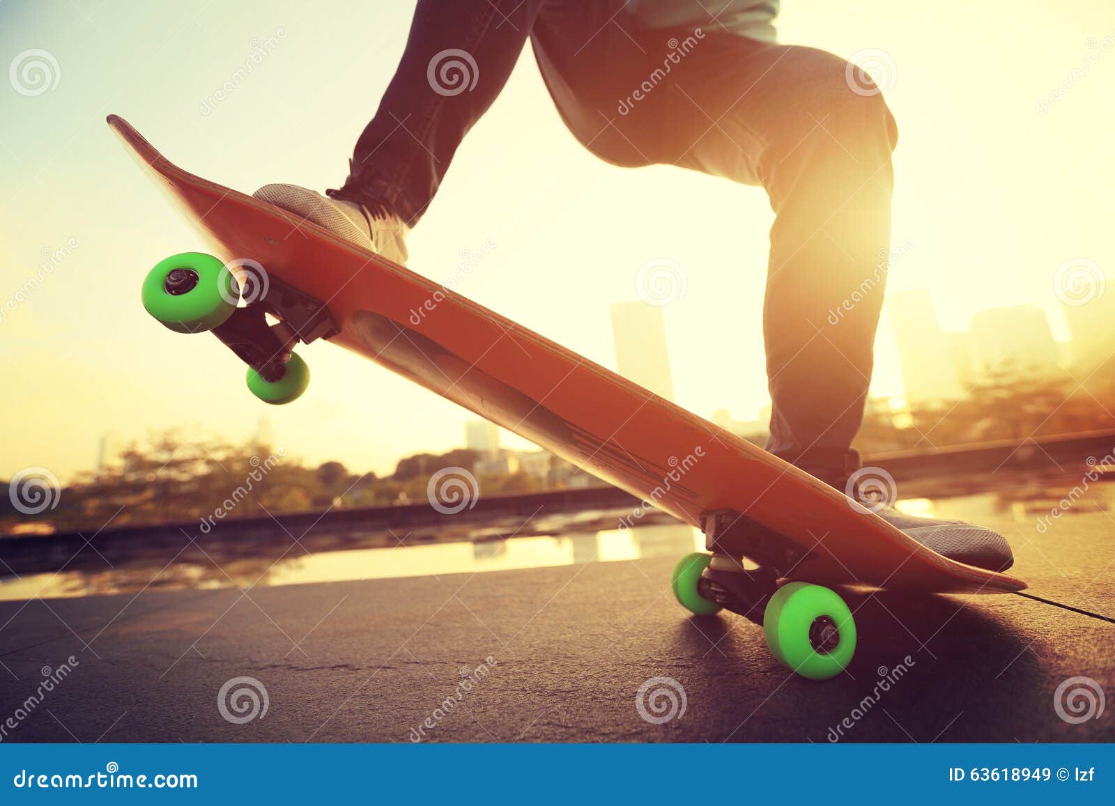 Sunlight over Legs of Person on Skateboard · Free Stock Photo
