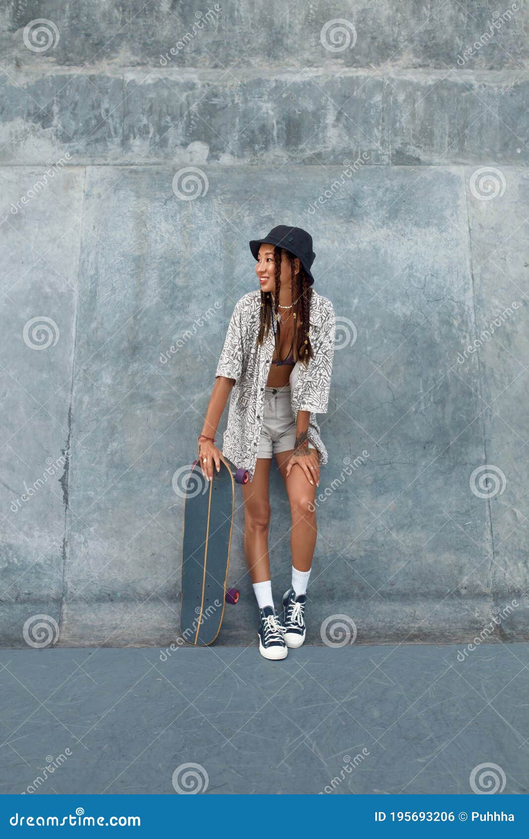 Skater Girl at Skatepark. Full-Length Portrait of Female Hipster in Casual  Outfit with Skateboard Against Concrete Wall. Stock Photo - Image of happy,  skate: 195693206