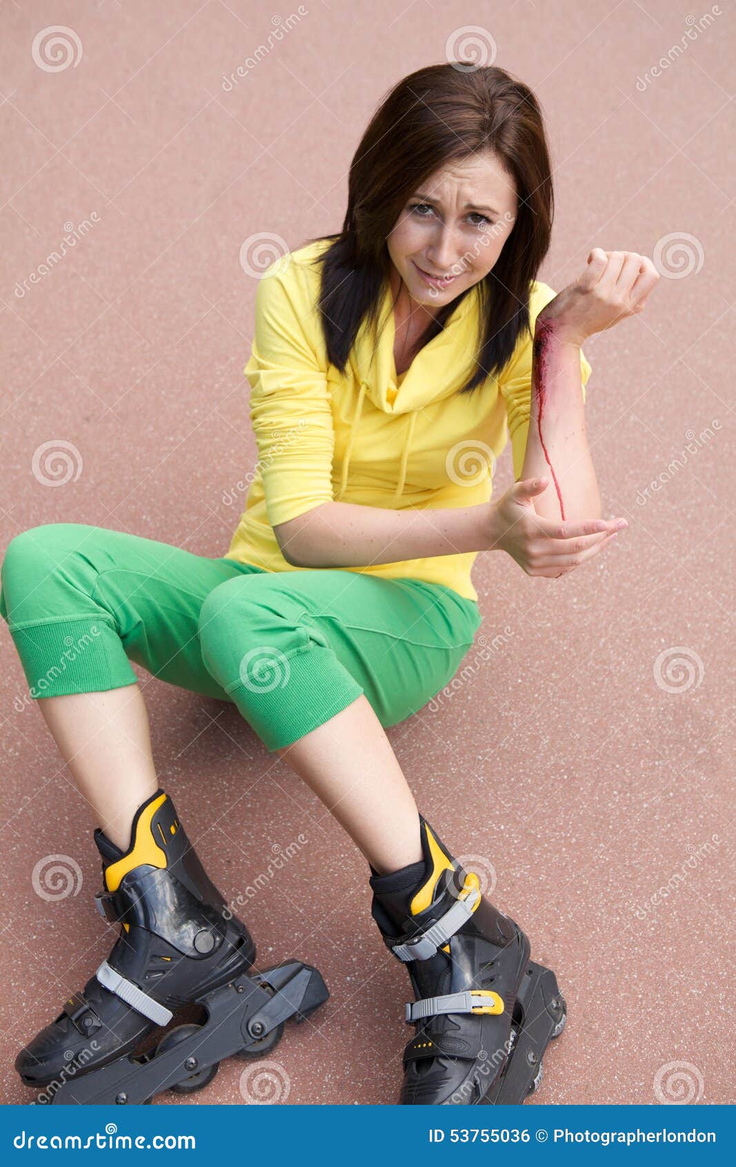 Skater Injured and Clutching Arm Stock Photo Image of pain
