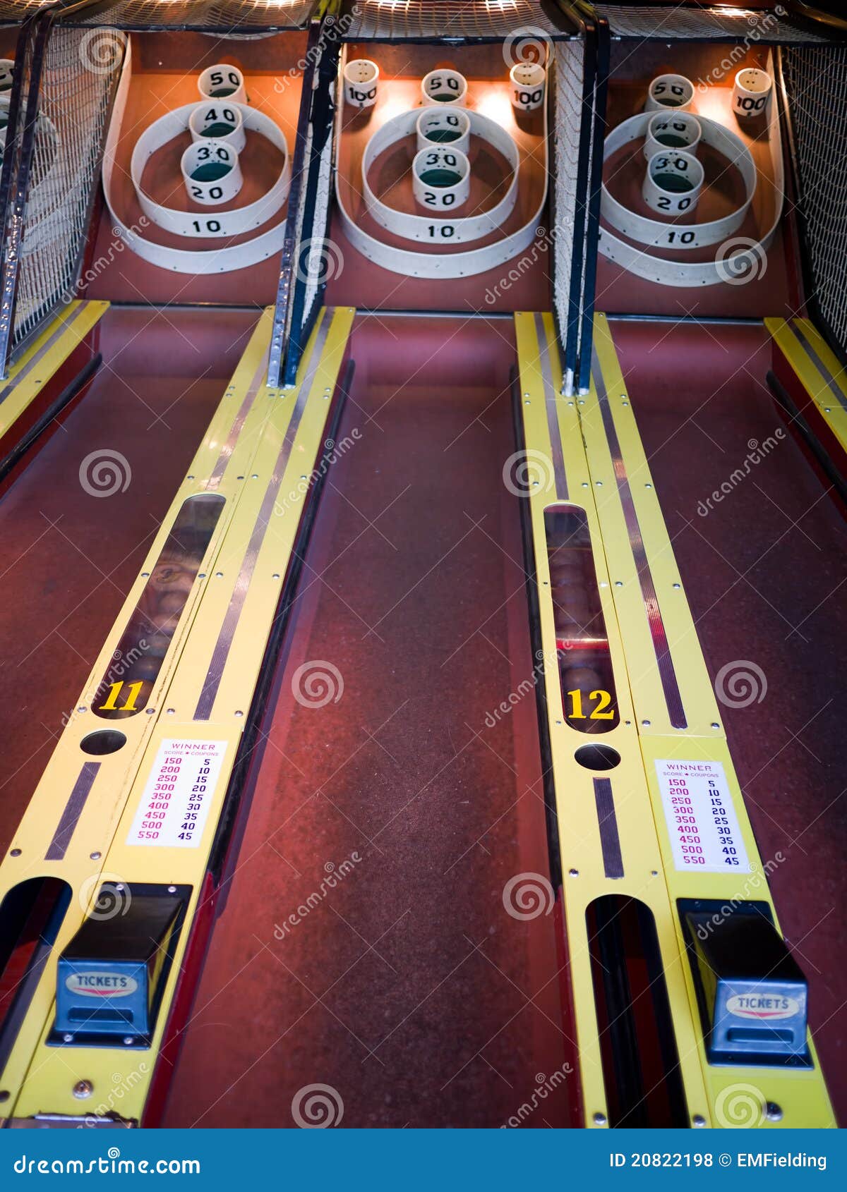 Skee Ball. Midway carnival Skeeball bowling amusement game at an arcade.