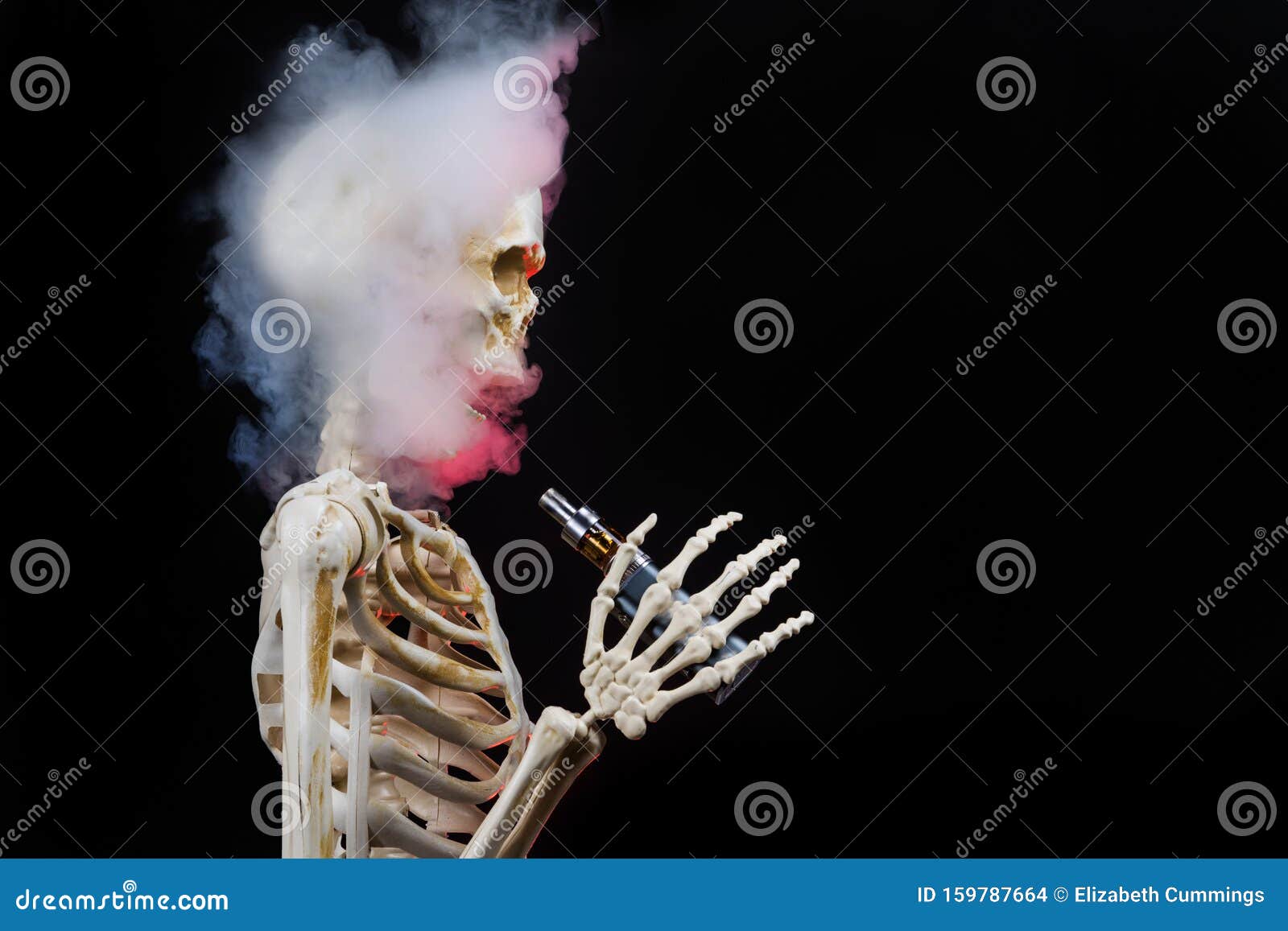 skeleton vaping clouds of red highlighted vapor with an ecigarette