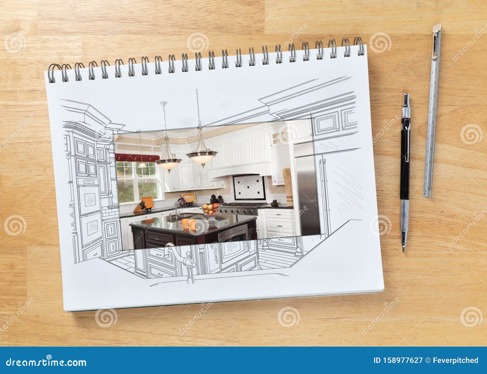 Sketch Pad On Desk With Drawing Of Custom Kitchen And Square