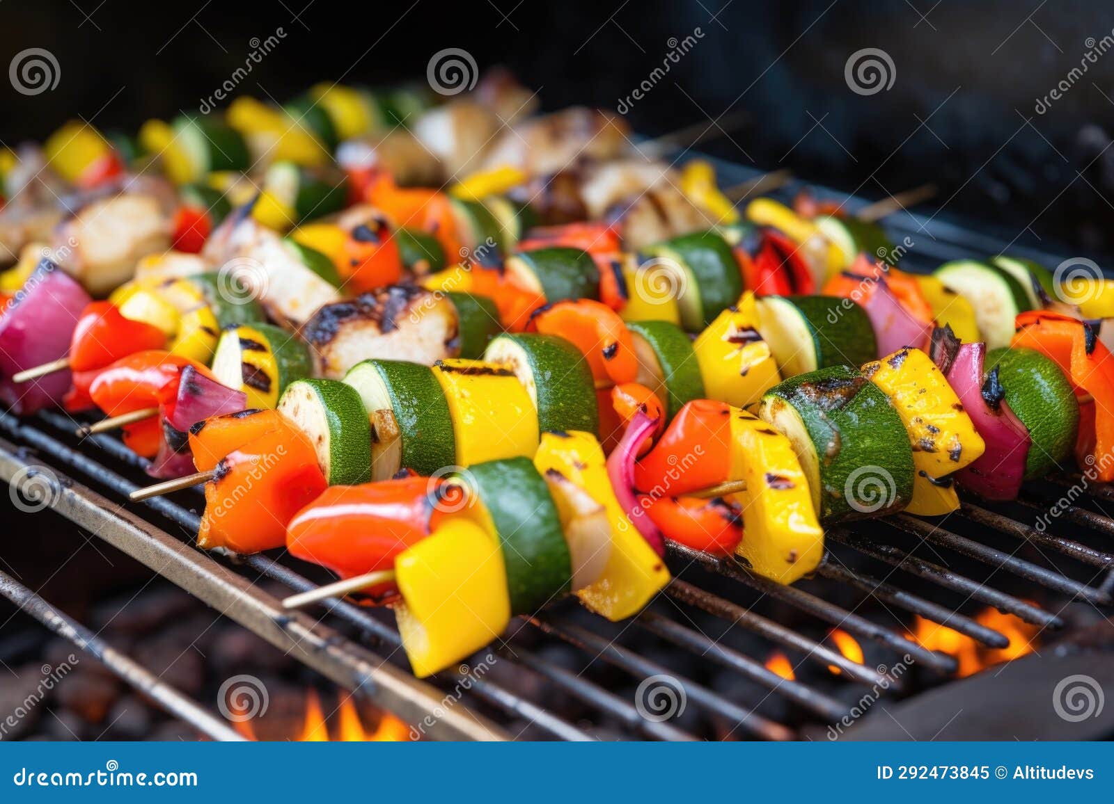 Skewered Vegetable Kabobs Roasting on Rotisserie Grill Stock Image