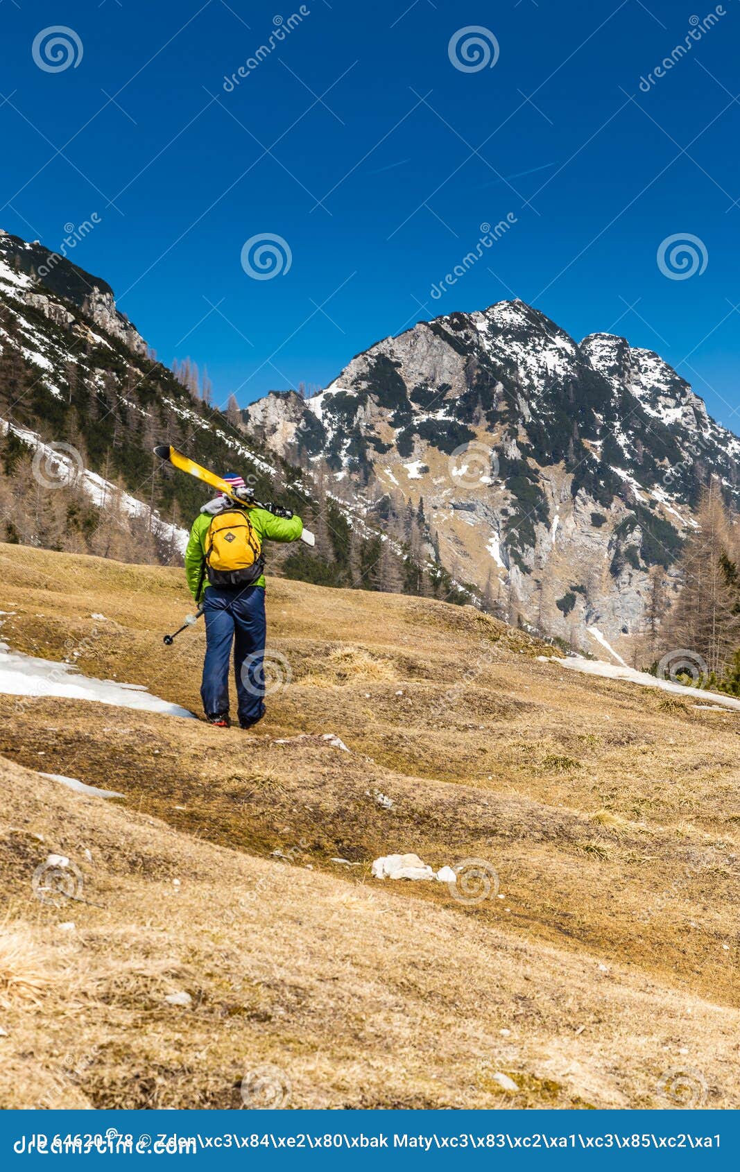 ski alpinist going up from vrsic pass-slovenia