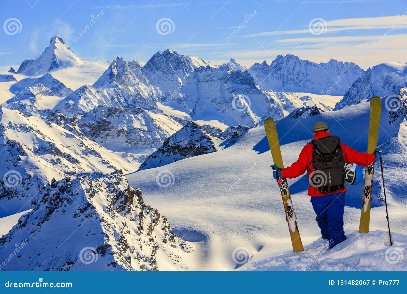 ski with amazing view of swiss famous mountains in beautiful winter snow mt fort. the skituring, backcountry skiing in fresh