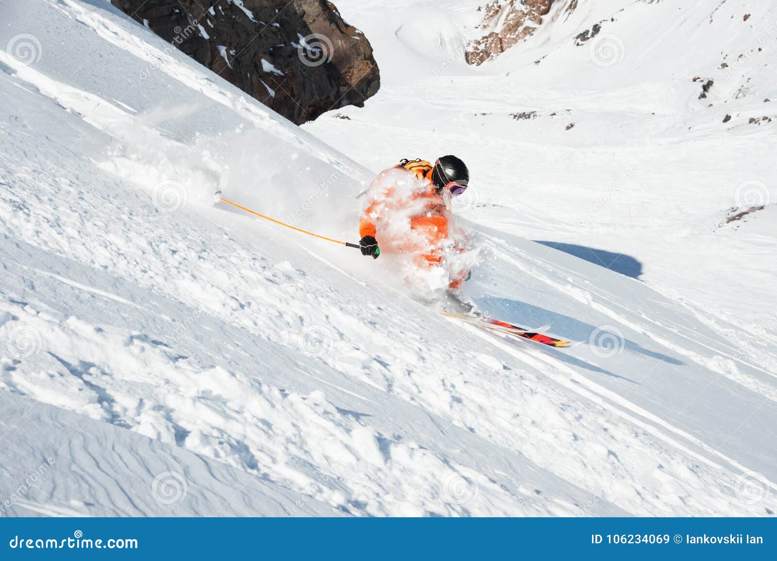 Ski Athlete in a Fresh Snow Powder Rushes Down the Snow Slope Stock ...
