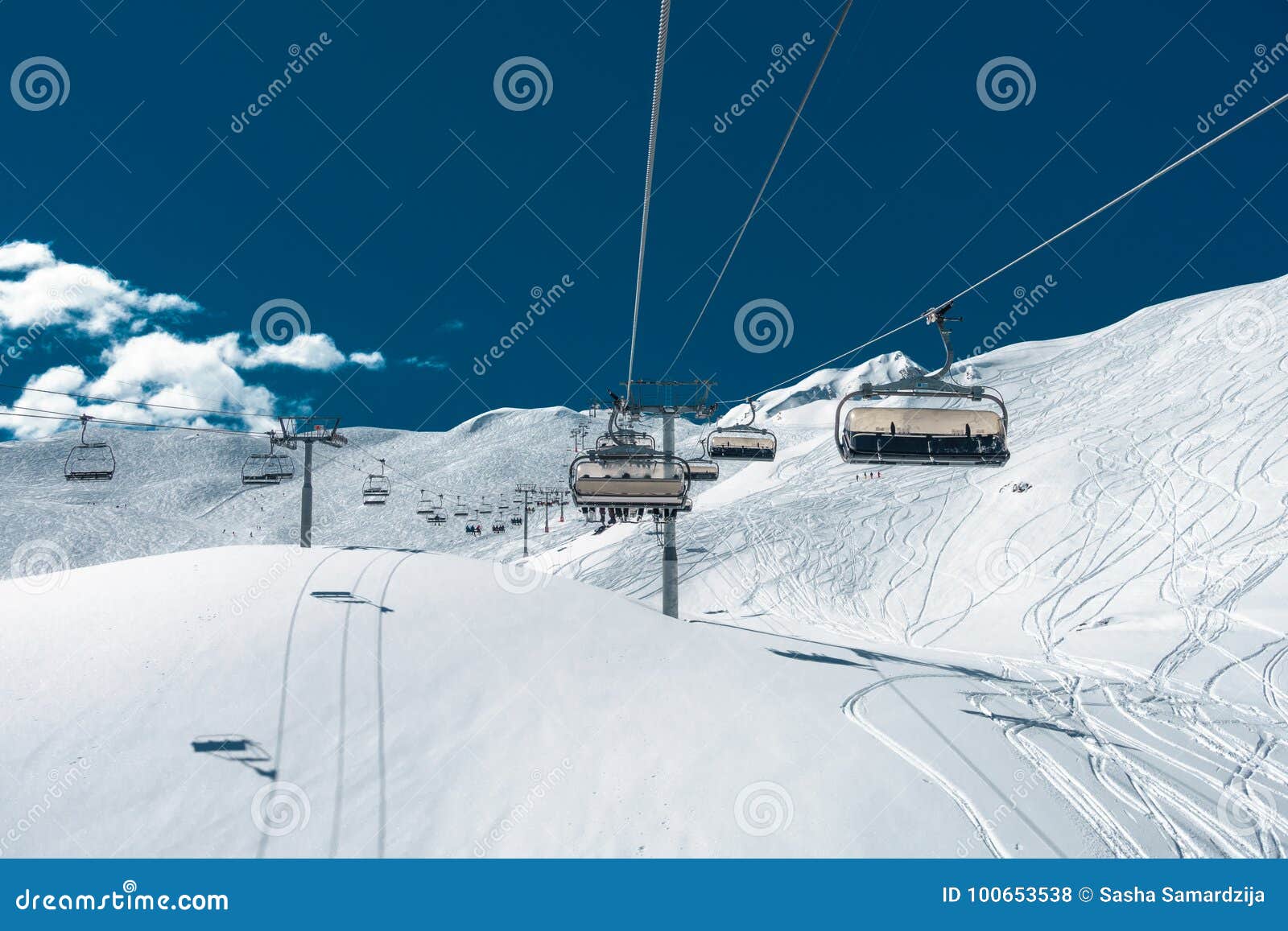 Ski lift cables and seats stock photo. Image of leisure 100653538