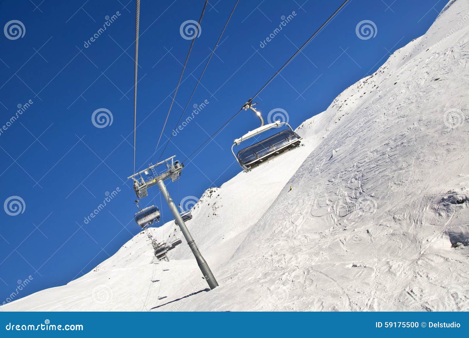 Ski lift and ski slope stock photo. Image of tourism 59175500