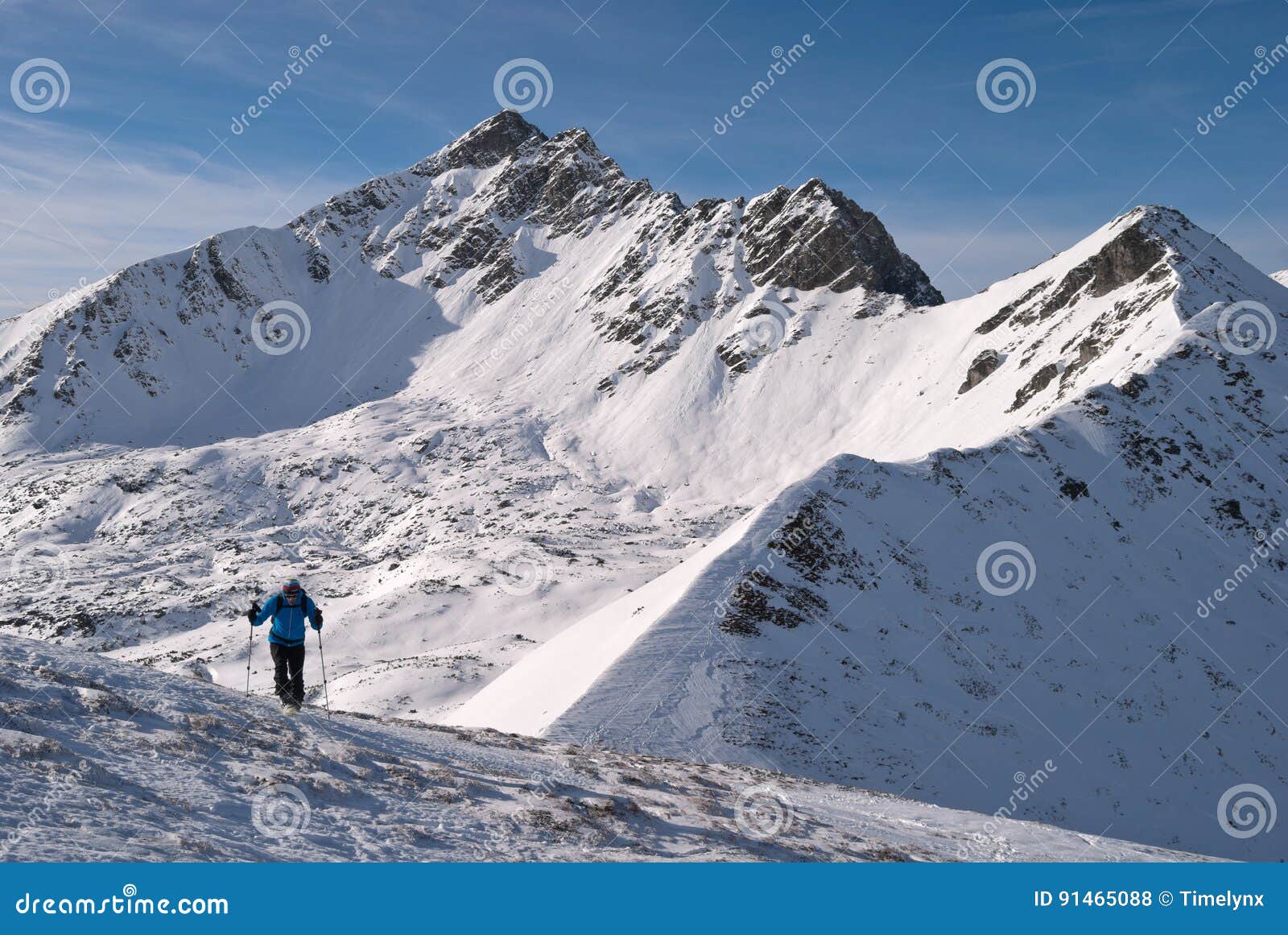 Ski Mountaineer With Snowy Rocky Mountain Peak In The Background Stock Photo Image Of Awareness Europe Ski Mountaineer With Snowy Rocky Mountain Peak In The Background Stock Photo Image Of Awareness Europe