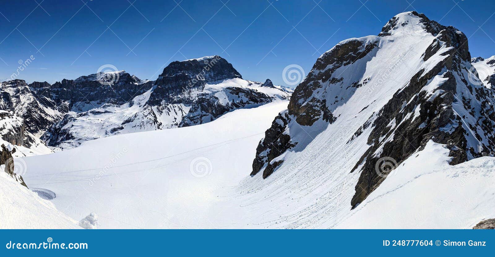 ski mountaineering in the glarus and uri alps. view of the bocktschingel and piz russein toedi. ski tour on the glacier