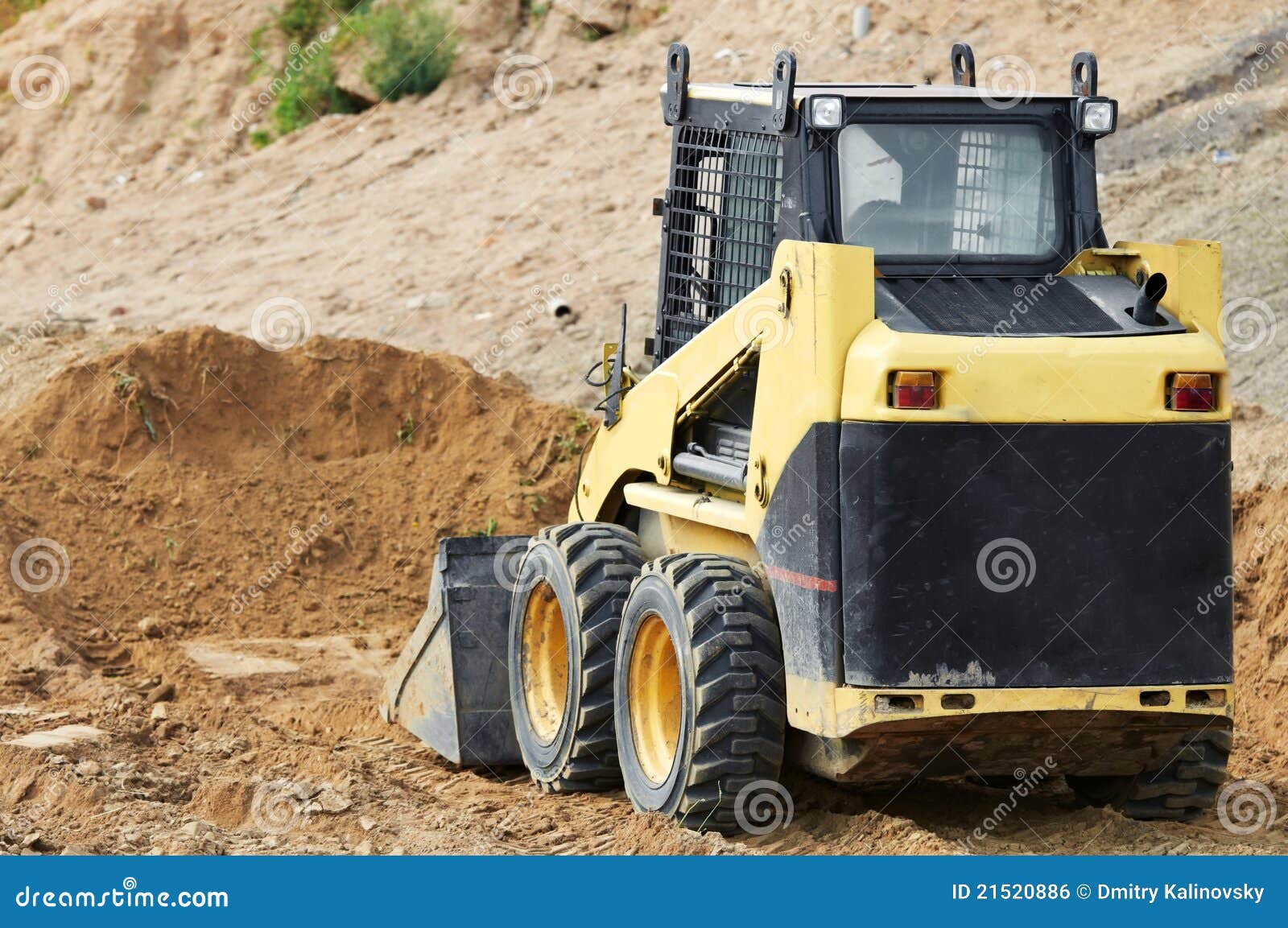 yellow bobcat machine logo