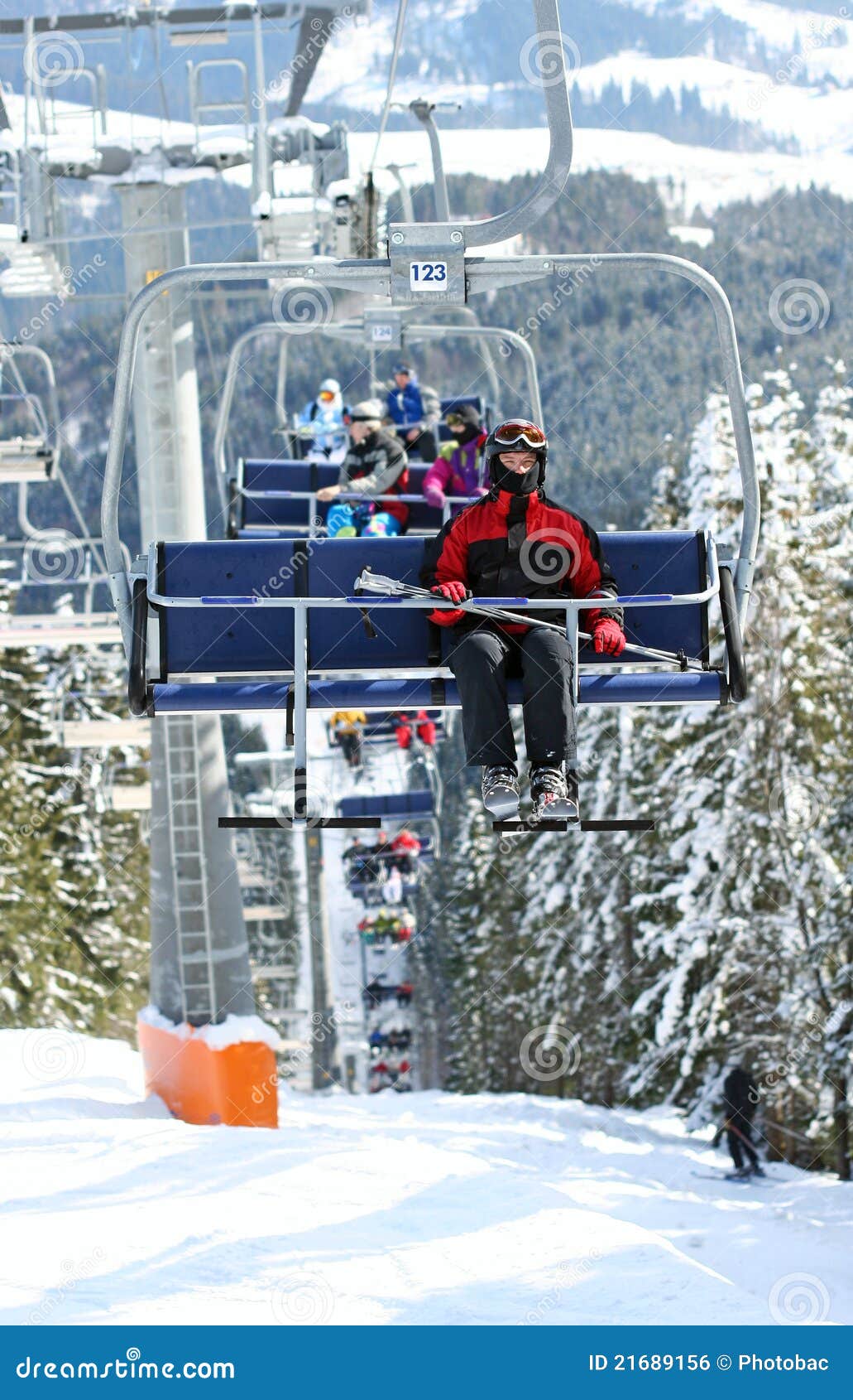 Skiers in chairlift stock photo. Image of mountain, seasonal 21689156