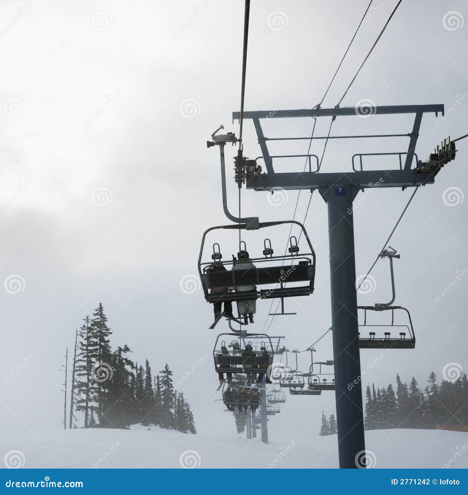 Skiers on chairlift. stock photo. Image of square, whistler 2771242