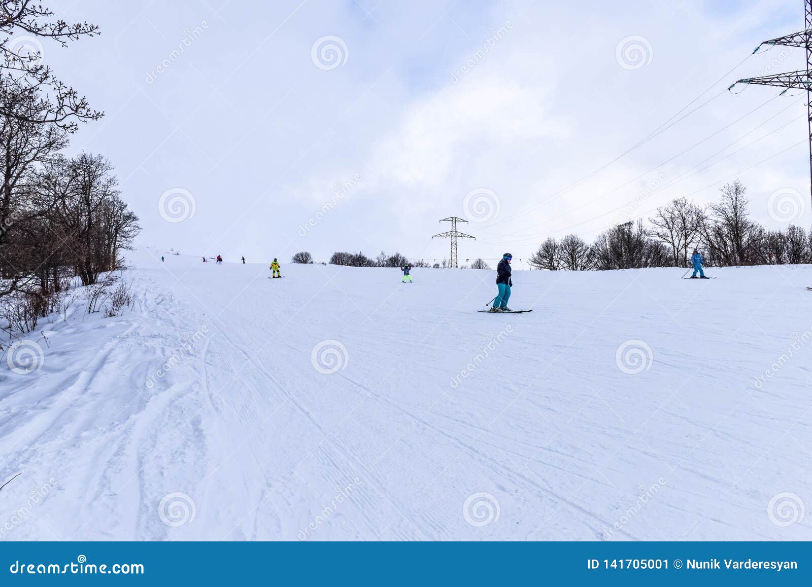 Skiers and Snowboarders on Ski Slope on Sunny Day . Editorial Photo ...