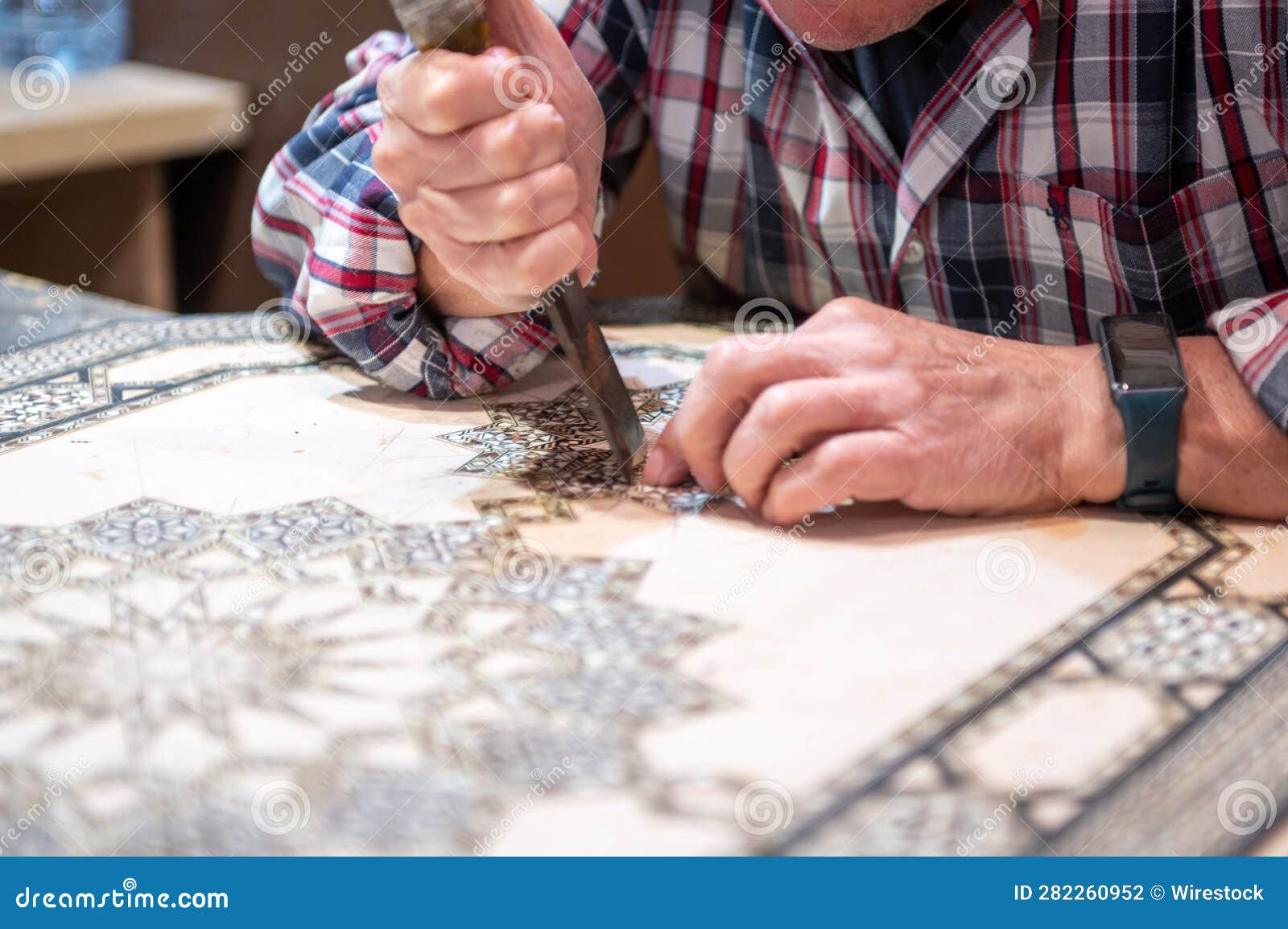 A Craftsman Making a Traditional Spanish Ceramic Tile in Granada ...
