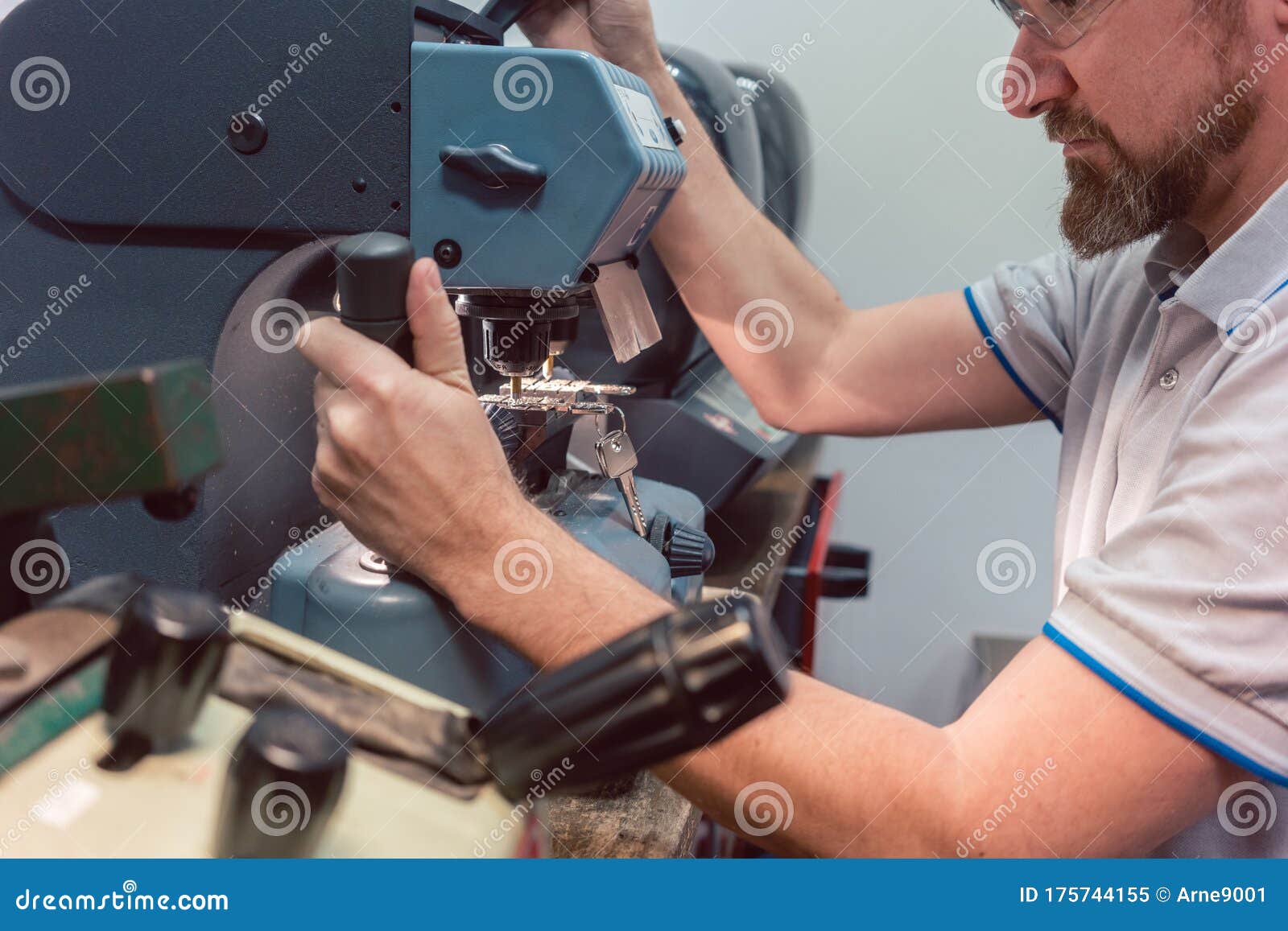 Locksmith Cutting Key with His Machine Stock Image Image of craftsman