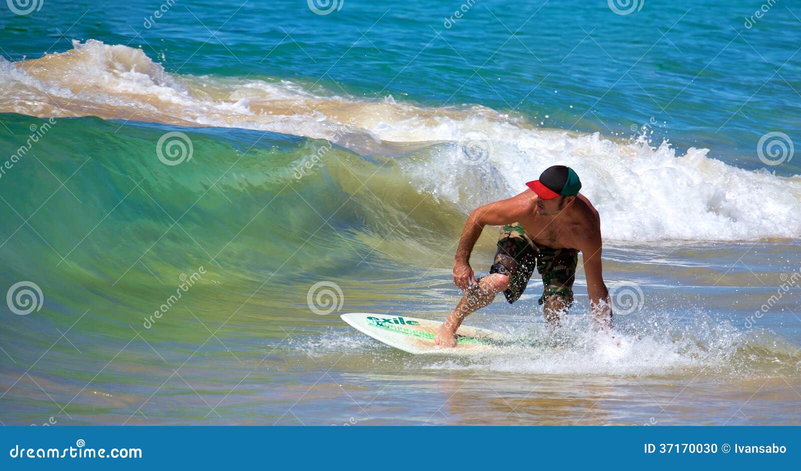 Skimboarding at Big Beach editorial image. Image of wave 37170030