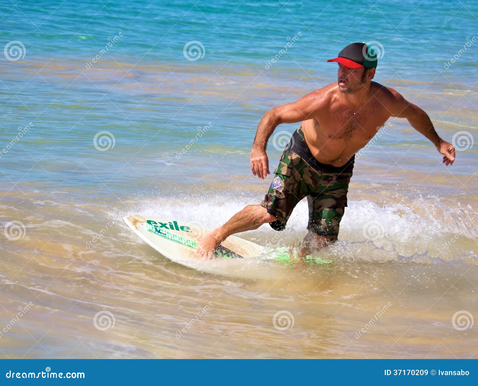 Skimboarding at Big Beach editorial stock image. Image of santa 37170209