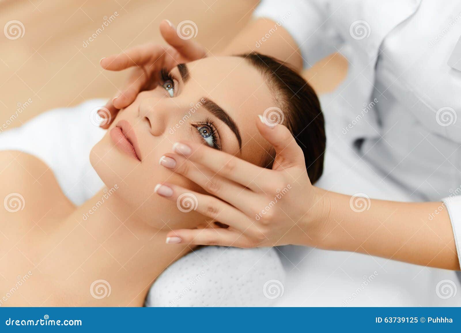 skin, body care. woman getting beauty spa face massage. treatment.
