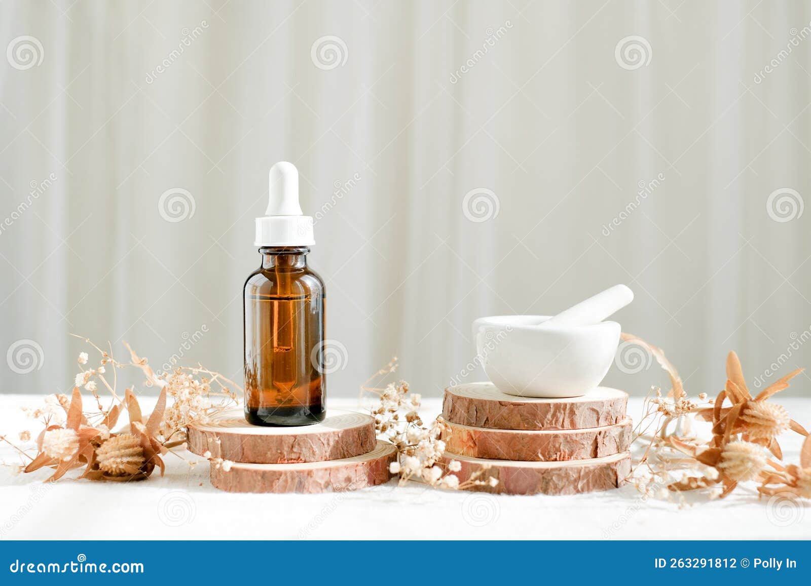 Skincare Bottle with Pestle and Mortar on Wooden Stand Decorate with
