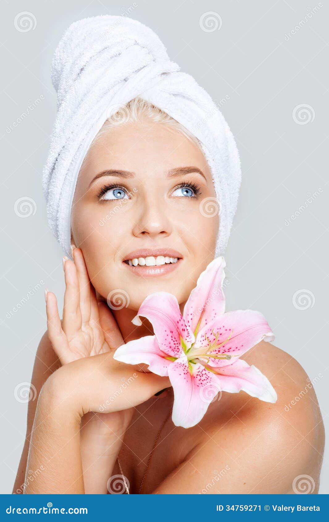 skincare-close-up-face-young-beautiful-woman-white-towel-pink-lily-gray-background-34759271.jpg