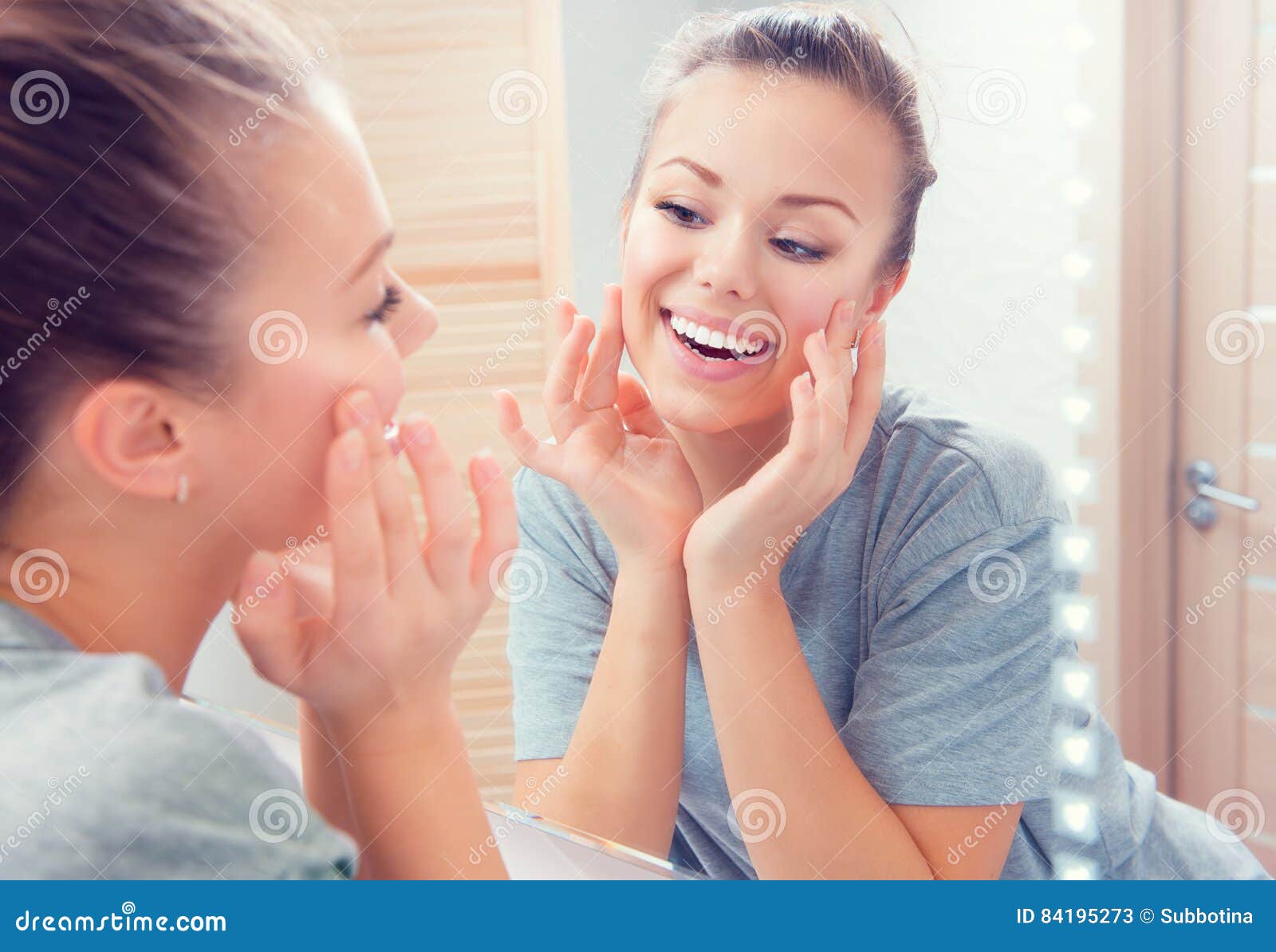 skincare. young beautiful teenage girl touching her face