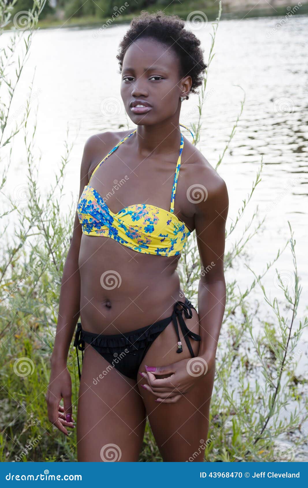 Slim Girl, Small Breasts Teenage Girl In Black Swimsuit Stock Photo,  Picture and Royalty Free Image. Image 162453743.